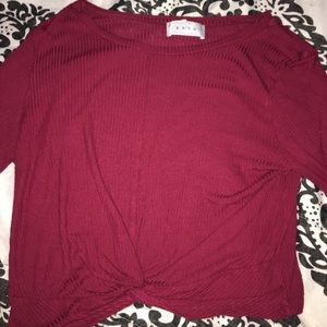 A long sleeve with a cute knot at the bottom